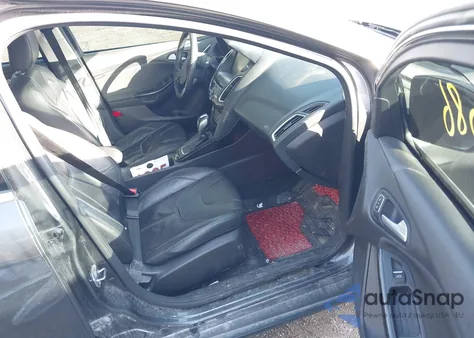 2015 Ford Focus Titanium from USA, damaged, VIN 1FADP3J27FL259029